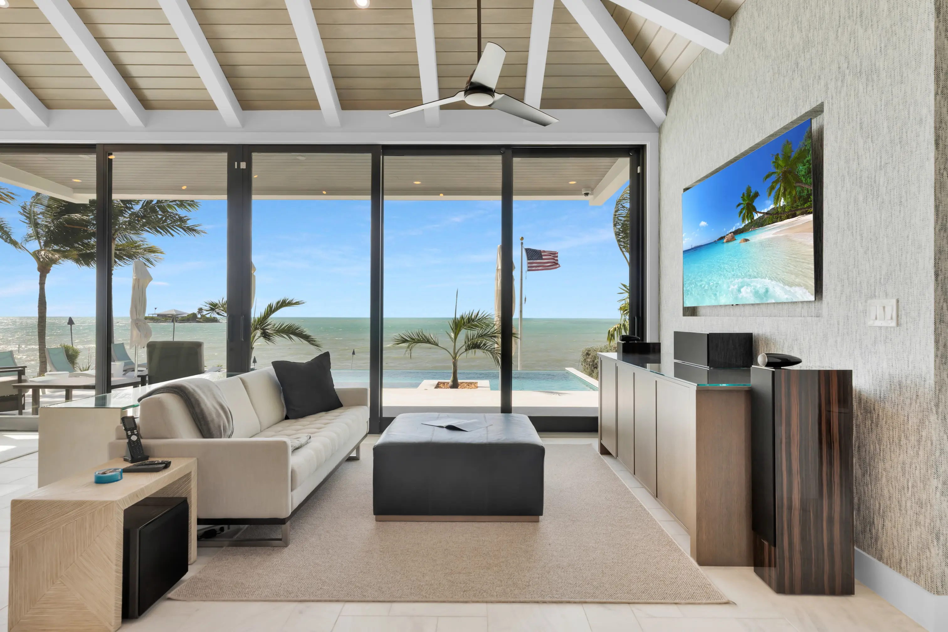 Living room with vaulted ceilings and ocean views
